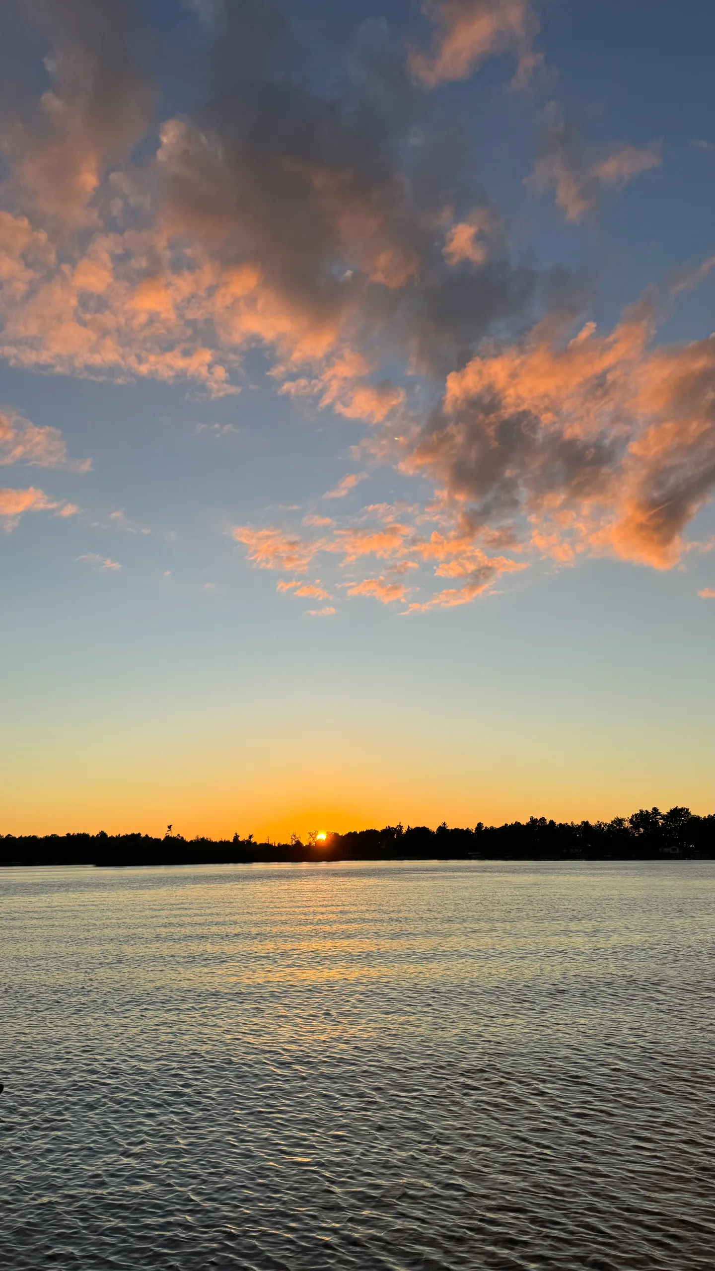 Sunset over a lake in Ames